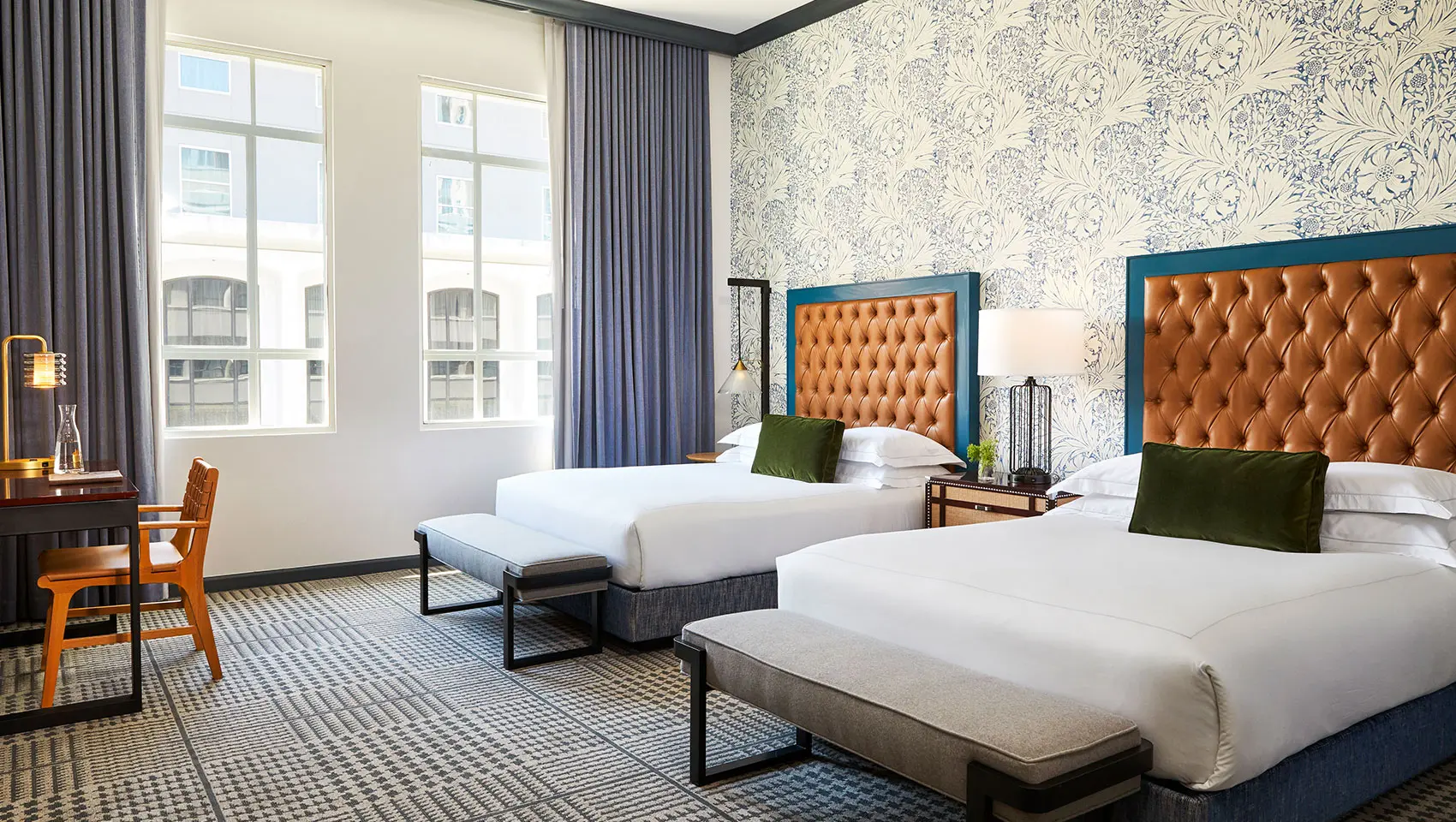 kimpton-denver-colorado-hotel-monaco-guestroom-double-queen-sleeping-room-desk-workspace-beds-3a04b121